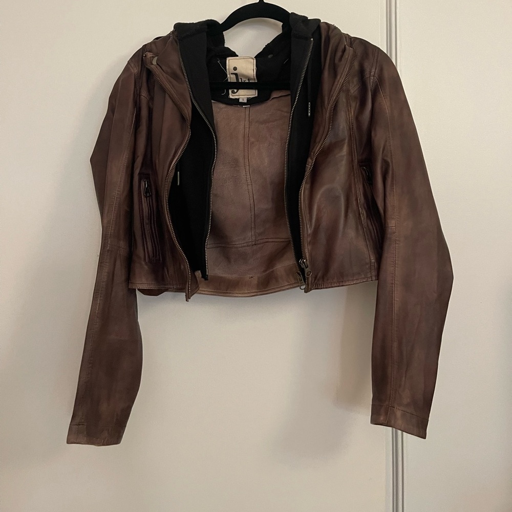 Brown leather jacket with black hood
